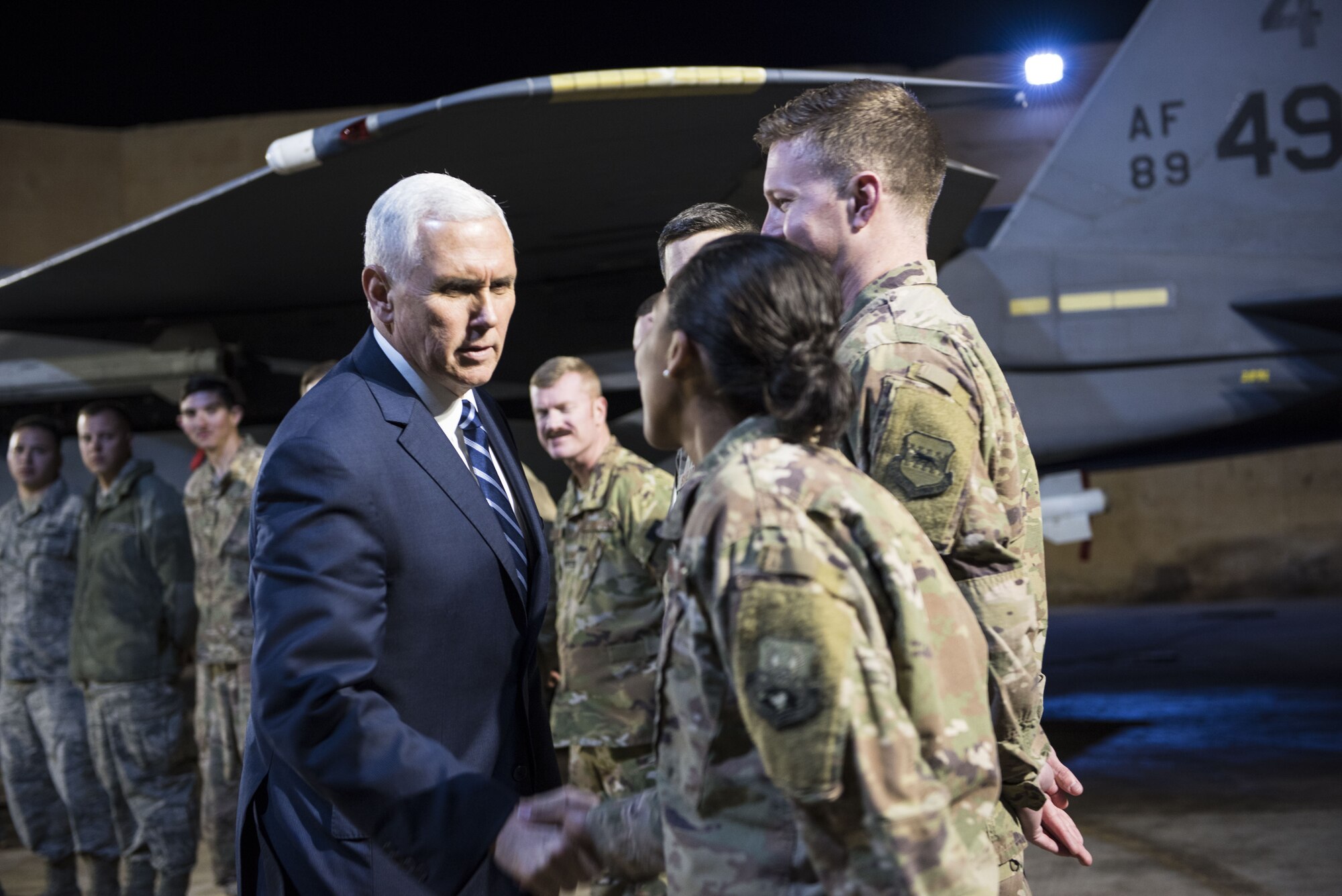 U.S. Vice President Mike Pence visits with deployed service members assigned to the 332d Air Expeditionary Wing January 21, 2018, at an undisclosed location in Southwest Asia. After a series of operations briefings, Pence addressed the crowd and took time to shake hands and take photos. (U.S. Air Force photo by Staff Sgt. Joshua Kleinholz)