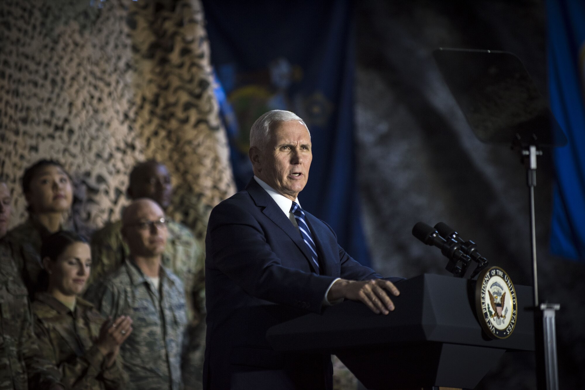 U.S. Vice President Mike Pence speaks to a crowd of deployed service members assigned to the 332d Air Expeditionary Wing January 21, 2018 at an undisclosed location in Southwest Asia. Pence visited the installation to thank service members for their continued efforts and receive briefings on recent progress in the fight against remaining Islamic State forces in the region. (U.S. Air Force photo by Staff Sgt. Joshua Kleinholz)