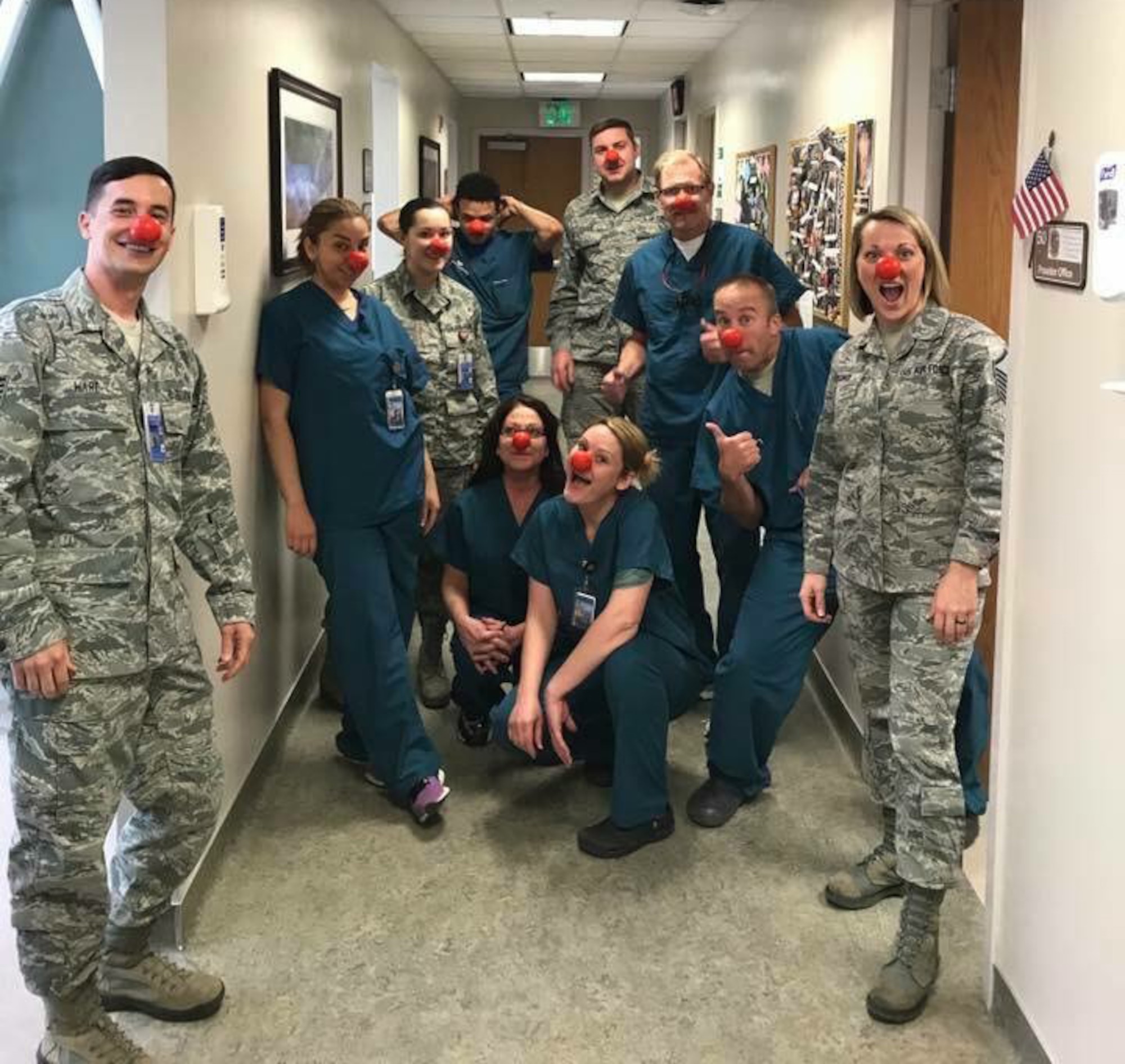 MSgt Ashley Strong (far right), U.S. Air Force dental flight chief out of Schriever Air Force Base, poses with her team for Red Nose Day to raise awareness about children in need on March 24th, 2017. Strong works closely with her team to instill a culture of patient-centered Trusted Care throughout the clinic. (U.S. Air Force photo by SrA Cody Helgeson)