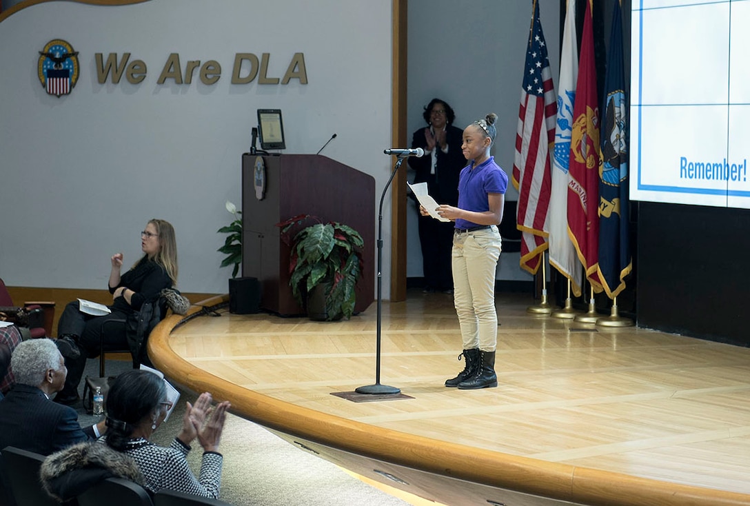 Aiyanna Harrison reads essay at DSCC's MLK program.