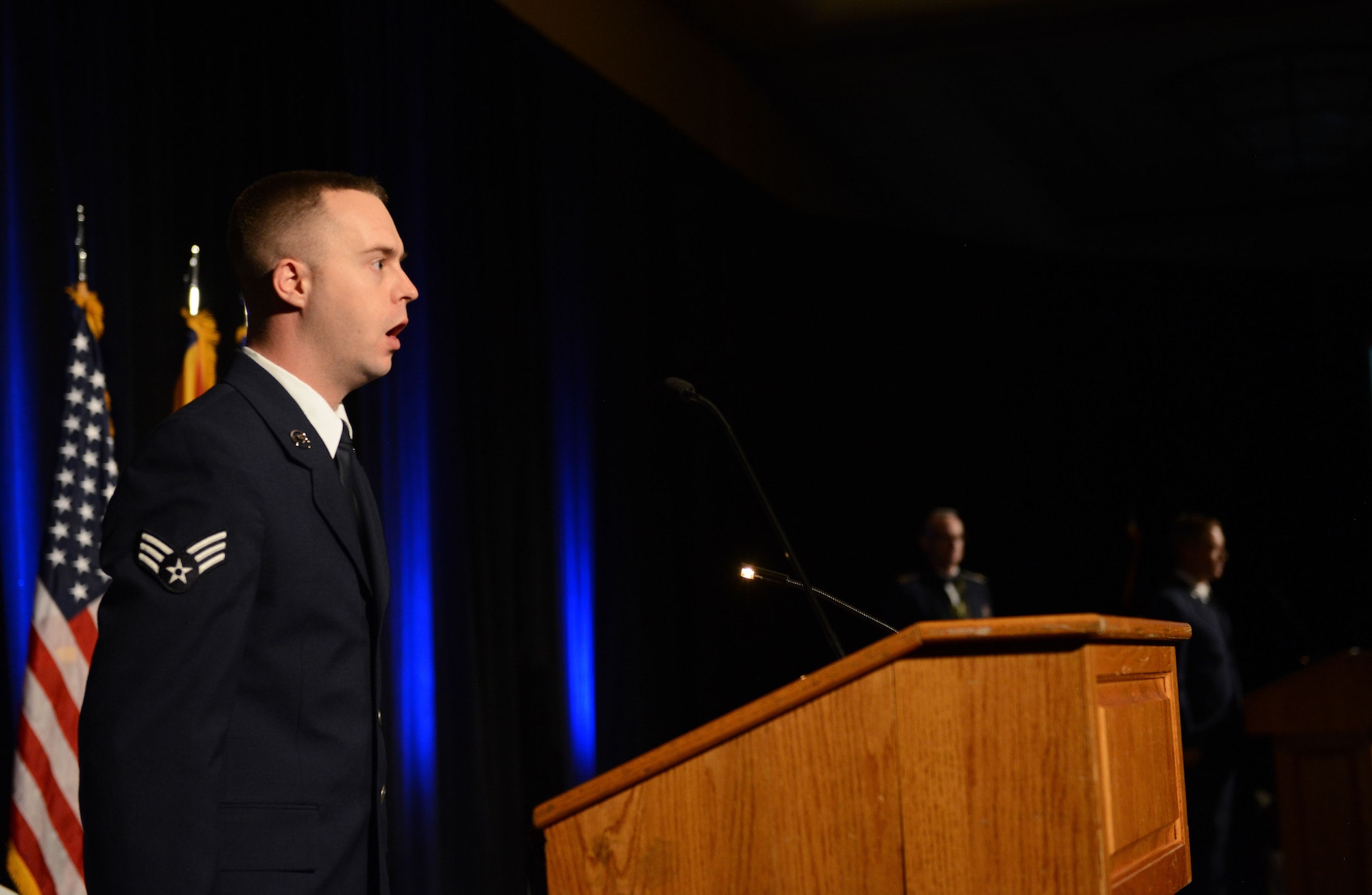 Senior Airman Timothy Orr, 944th Operations Group aviation resource manager, sings the national anthem during the 2017 Annual Awards Banquet at The Wigwam in Litchfield Park, Ariz., Jan. 20, 2018. The 2017 Annual Awards Banquet was held to recognize and award the best and brightest Airmen from Luke Air Force Base. (U.S. Air Force Photo/Airman 1st Class Alexander Cook)