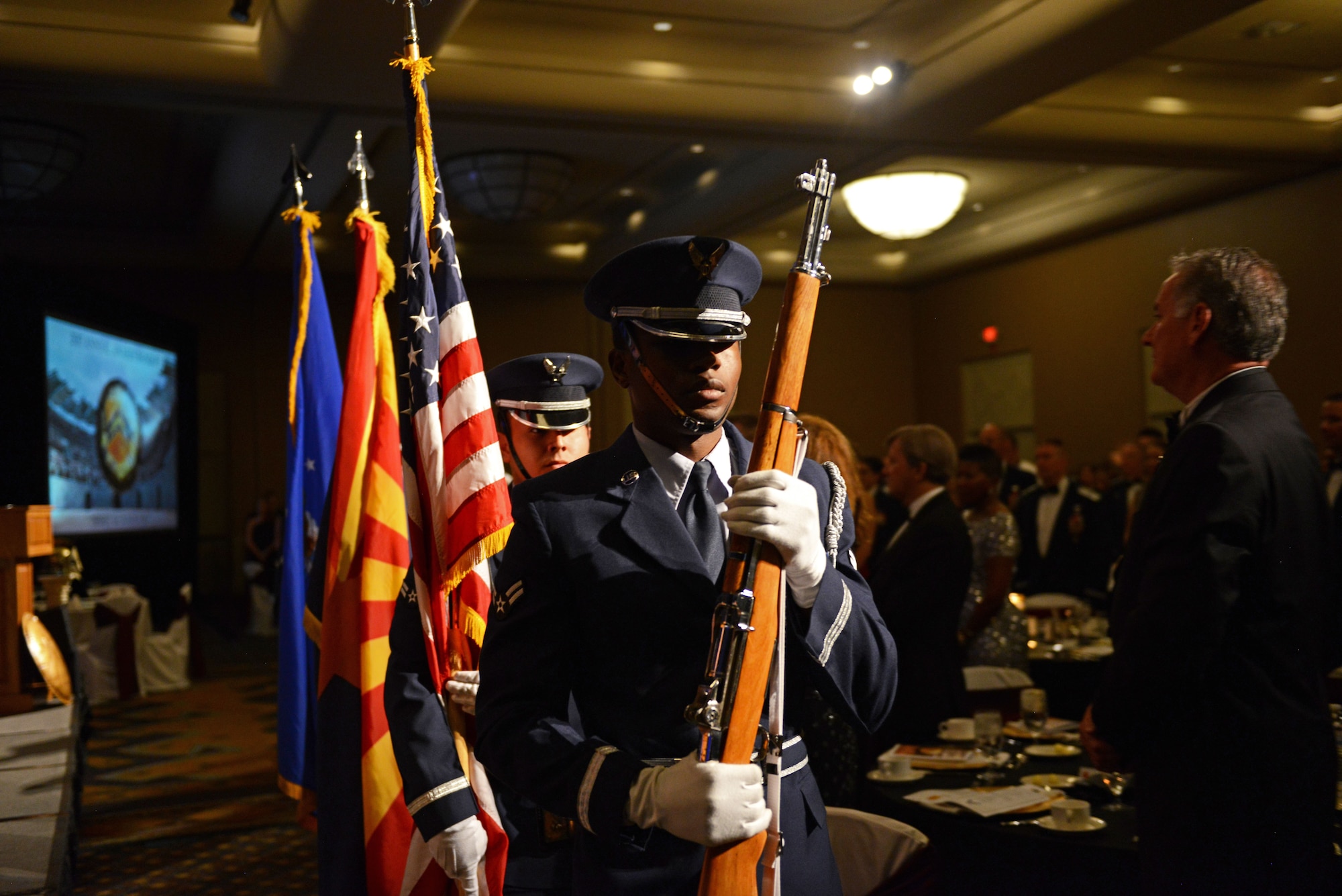 The Luke Air Force Base Color Guard present the colors at the 2017 Annual Awards Banquet in Litchfield Park, Ariz., Jan. 20, 2018. The 2017 Annual Awards Banquet was held to recognize and award the best and brightest Airmen from Luke. (U.S. Air Force Photo/Airman 1st Class Alexander Cook)
