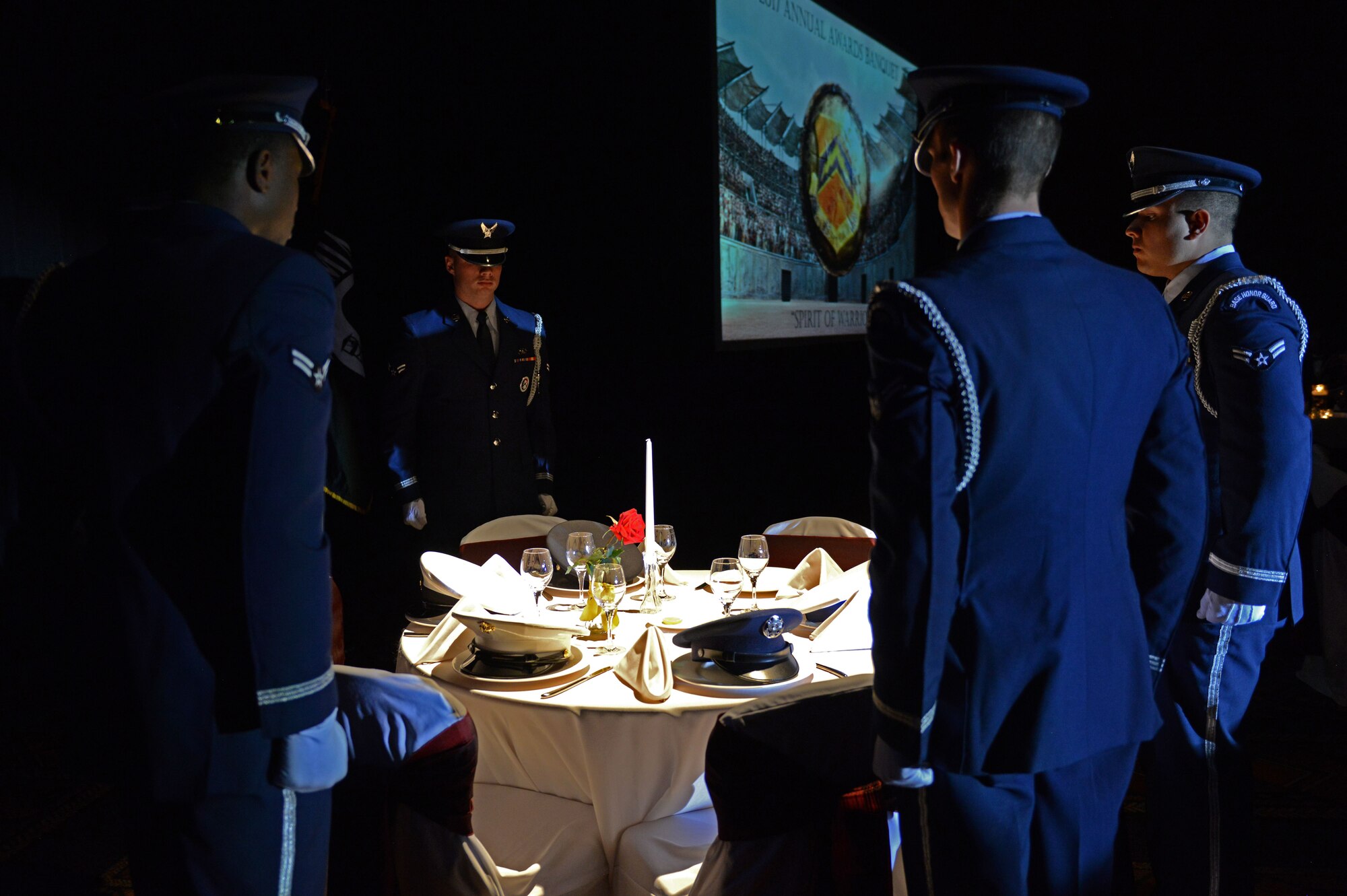 The Luke Air Force Base Honor Guard performs the Missing Man Table and Honors Ceremony at the 2017 Annual Awards Banquet in Litchfield Park, Ariz., Jan. 20, 2018. The Prisoner of War, Missing in Action Ceremony is performed at military banquets in remembrance of service members killed or missing in action. (U.S. Air Force photo/Airman 1st  Class Alexander Cook)