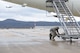 Senior Airman Christian Sharpe, 721st Air Maintenance Squadron crew chief, secures a mobile staircase to the United States National Aeronautics and Space Administration Armstrong Flight Research Center aircraft on Jan. 18, 2017 at Ramstein Air Base. According to NASA, continued investment and support will create future U.S. aircraft that consume only half as much fuel and generate only one quarter of current emissions compared to aircraft flown today.