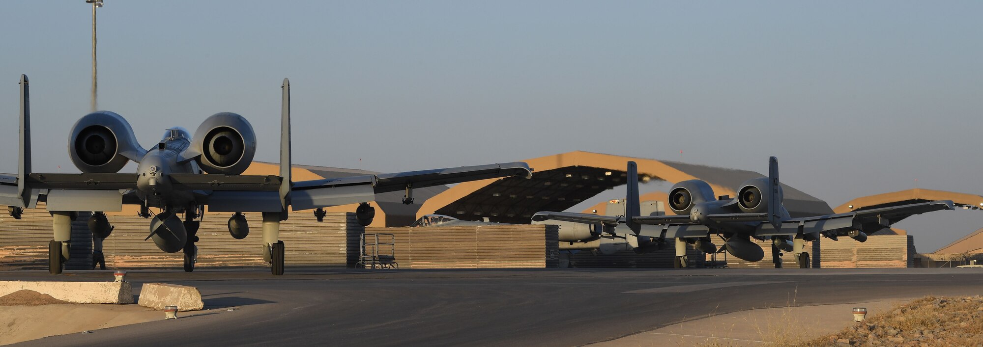 A-10 Thunderbolt IIs, assigned to Whiteman Air Force Base, taxi down the flight line on Kandahar Airfield, Afghanistan, Jan. 19, 2018.