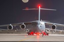 Airman marshalls C-17 aircraft