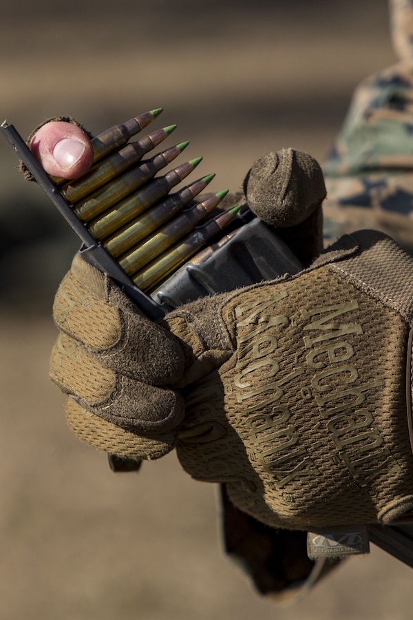 A Marine with 3rd Battalion, 6th Marine Regiment, 2nd Marine Division loads rounds into a magazine during a Tactical Small Unit Leaders Course at Camp Lejeune, N.C., Jan. 16, 2017. The 10-day course provides small unit leaders with the confidence, knowledge and ability to effectively lead Marines in combat situations. The course aimed to make the Marines team leaders and increase proficiency with various weapon systems and tactics so they can mentor their Marines and become a more effective team.