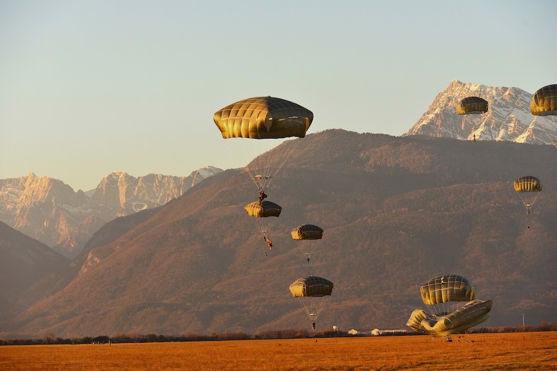 Paratroopers descend onto Juliet Drop Zone during airborne operations in Pordenone, Italy.