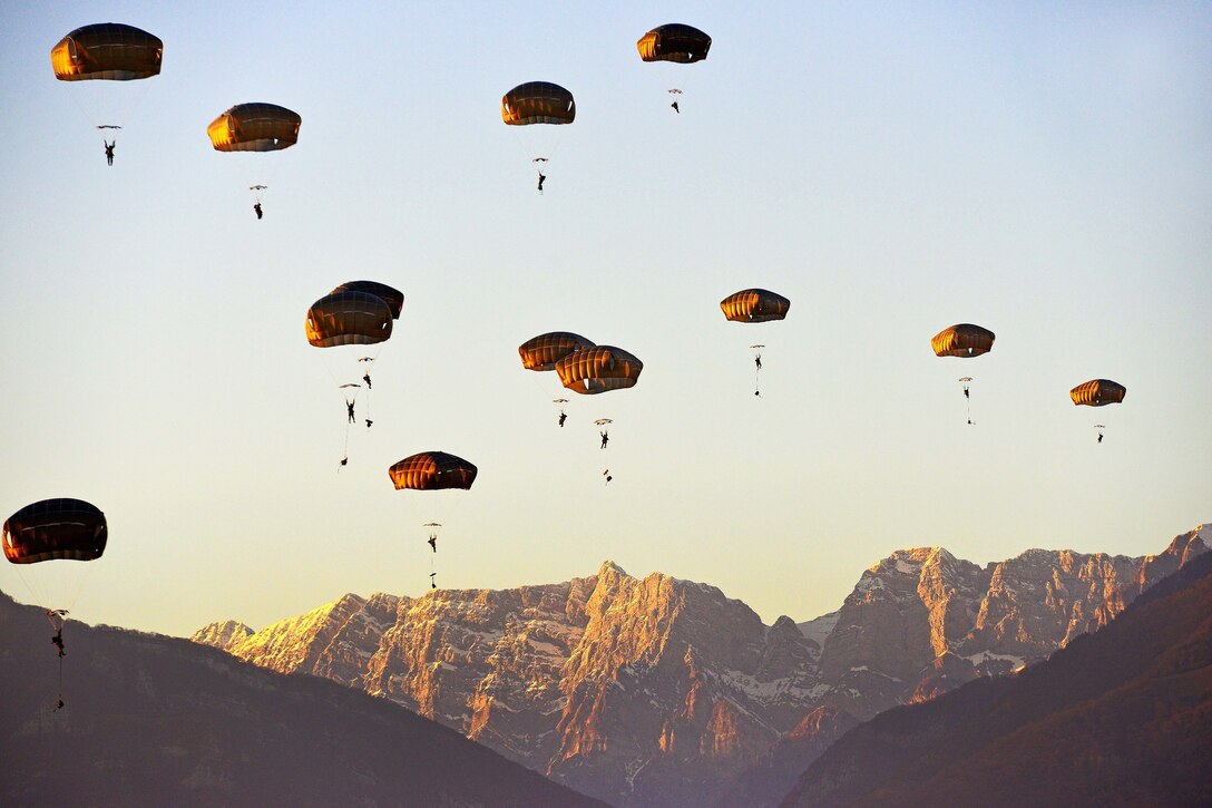 Paratroopers descend onto Juliet Drop Zone during airborne operations.
