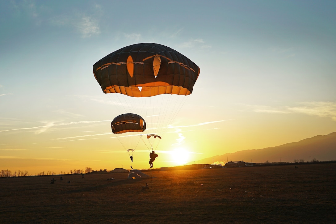 Airborne soldiers land at Juliet Drop Zone in Pordenone, Italy.