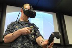 A sailor tests a virtual reality device.