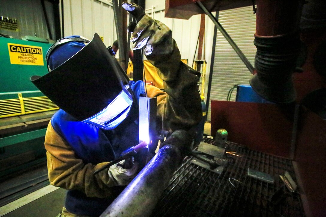 Ohio Army National Guard Sgt. Trevor Hale performs gas tungsten arc welding on stainless steel.