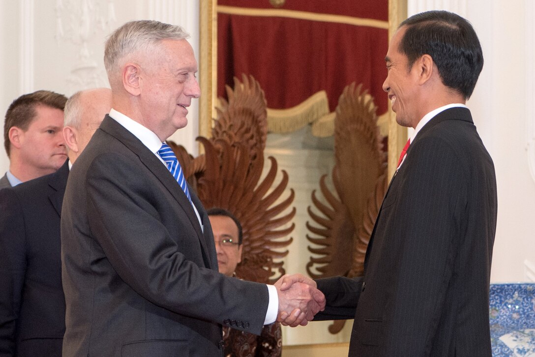 Defense Secretary James N. Mattis shakes hands with the Indonesian president.