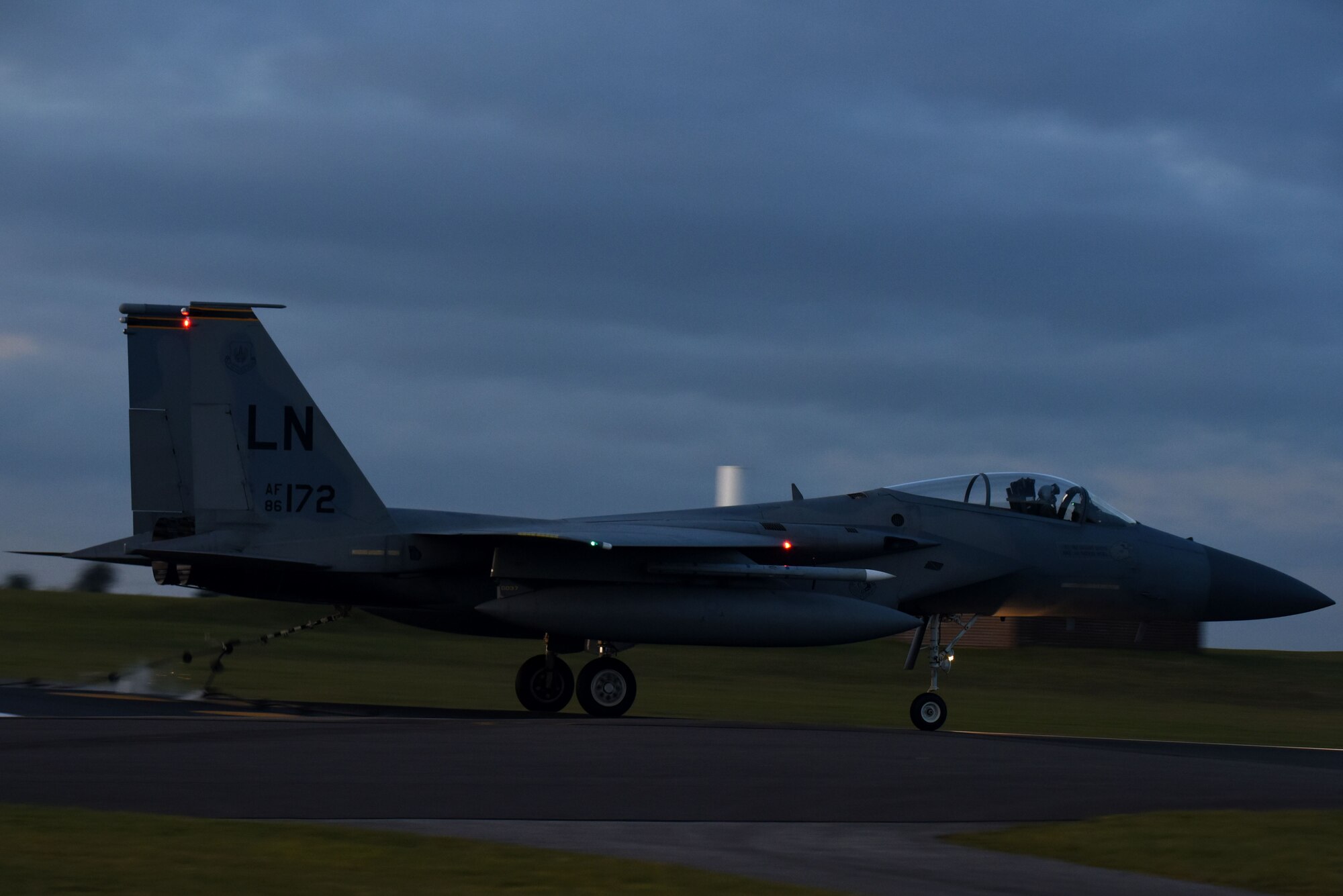 An F-15C Eagle assigned to the 493rd Fighter Squadron catches an aircraft arresting system during a certification Jan. 22, 2018 at Royal Air Force Lakenheath, England. The aircraft arresting systems are designed to bring aircraft to a safe stop during emergency situations. (U.S. Air Force photo/Airman 1st Class Eli Chevalier)