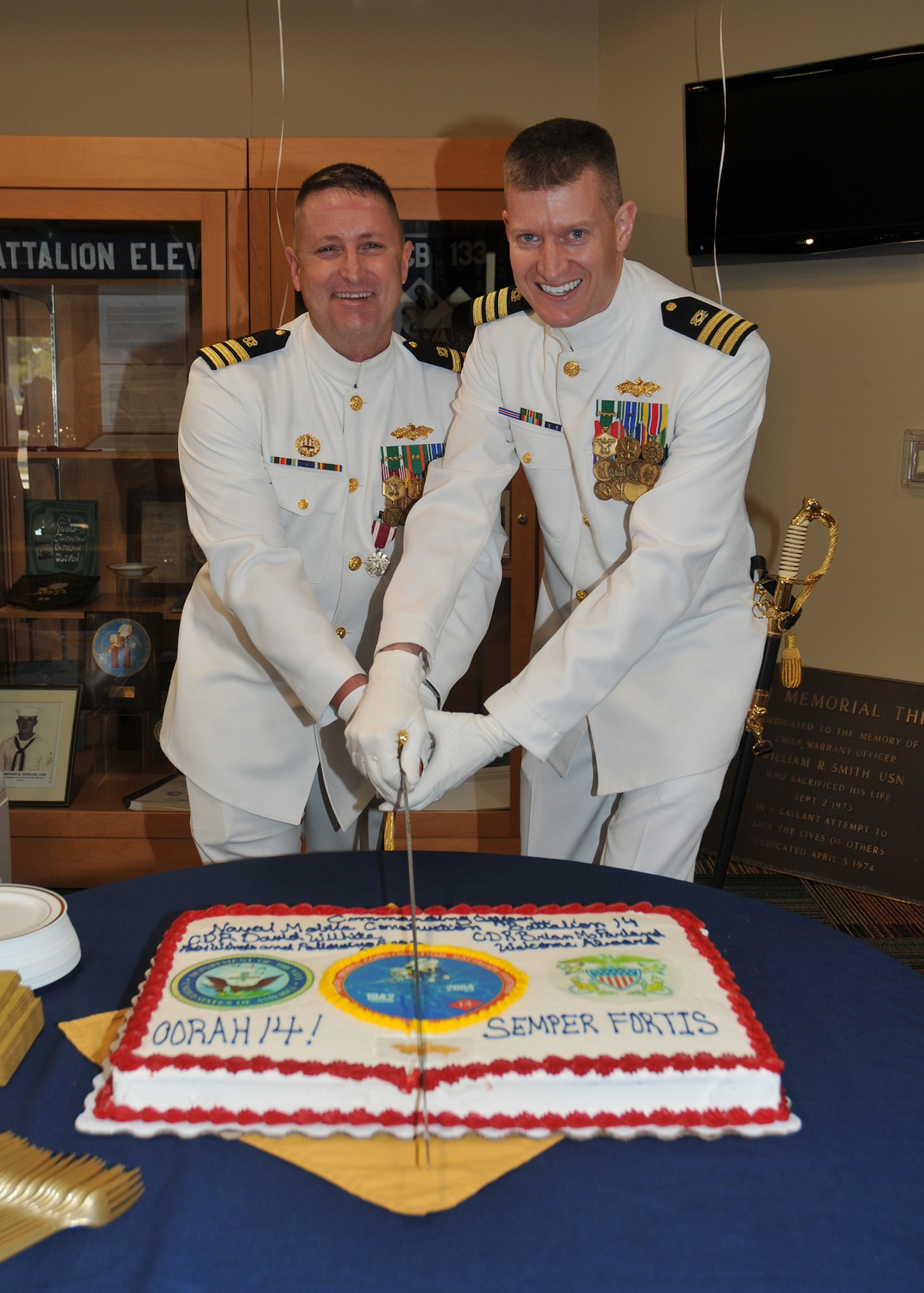 Cmdr. Brian McFarland (right) relieves Cmdr. David Wilhite as the incoming Commanding Officer of Naval Mobile Construction Battalion 14 on Nov. 4, 2017, in Gulfport, Mississippi. Wilhite is the Arnold Air Force Base Simplified Acquisition Base Engineering Requirements program manager. (Courtesy photo)