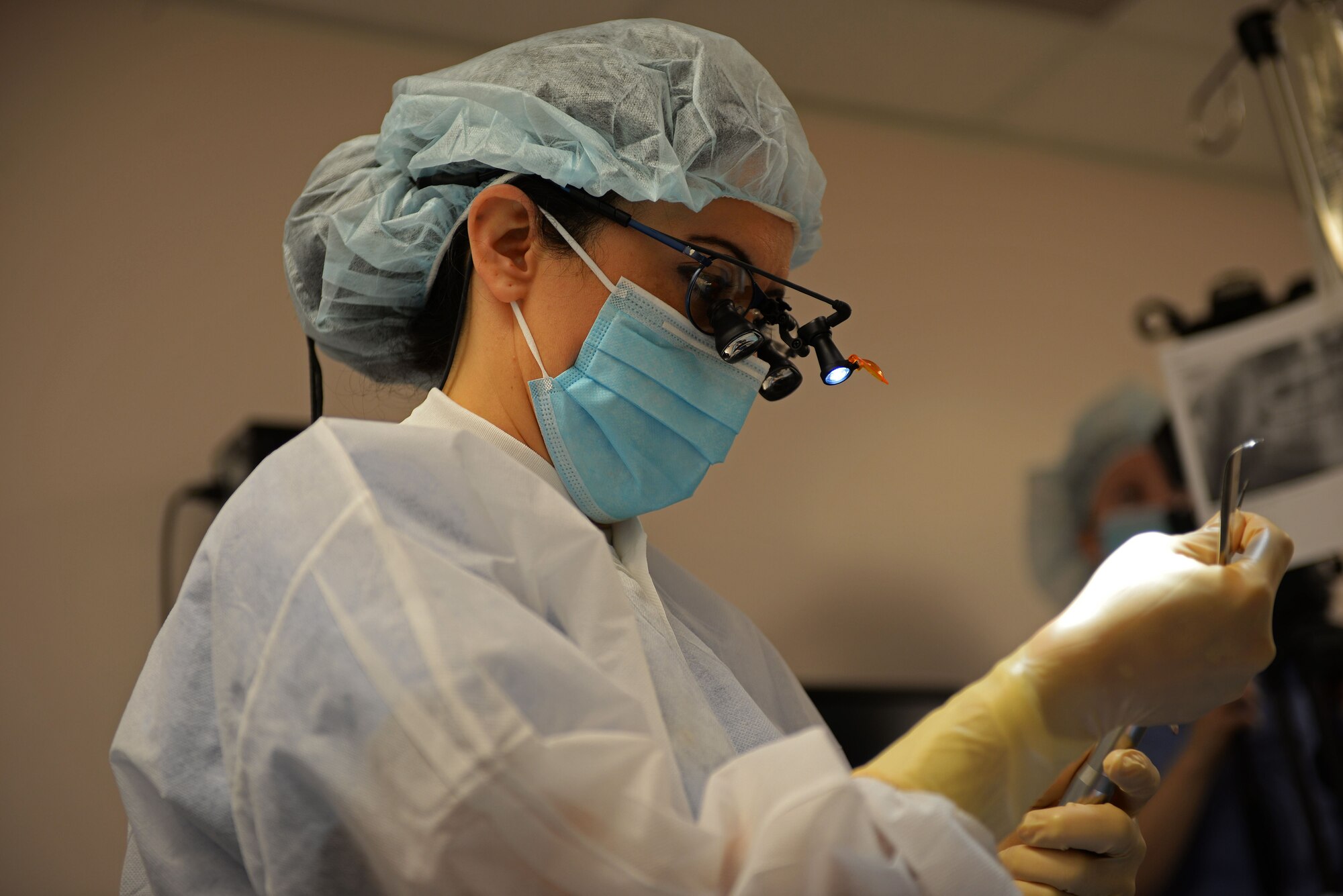 U.S. Air Force Maj. Jamie Smith, 20th Dental Squadron dental flight commander, prepares to numb her patient at Shaw Air Force Base, S.C., Jan. 17, 2018.