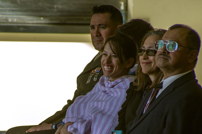 Attendants of a memorial held for Staff Sgt. Enrico Antonio Rojo reminisce on the memory of Staff Sgt. Rojo’s life aboard the Marine Air Ground Combat Center, Twentynine Palms, Calif., Jan. 21, 2018. He served in the Marine Corps Reserve from 2009-2016. Staff Sgt. Rojo was awarded a Navy and Marine Corps Medal for attempting to help the victim of a car accident on December 16, 2016. (U.S. Marine Corps photo by Pfc. Rachel K. Porter)