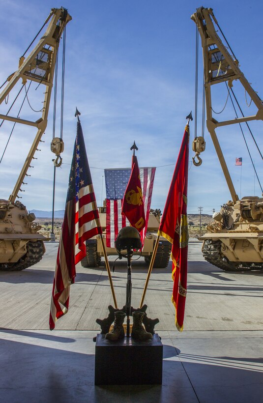 Flags are on displayed at a memorial for Staff Sgt. Enrico Antonio Rojo, held aboard the Marine Corps Air Ground Combat Center, Twentynine Palms, Calif., Jan. 21, 2018. He served in the Marine Corps Reserve from 2009-2016. Staff Sgt. Rojo was awarded a Navy and Marine Corps Medal for attempting to help the victim of a car accident on December 16, 2016. (U.S. Marine Corps photo by Pfc. Rachel K. Porter)
