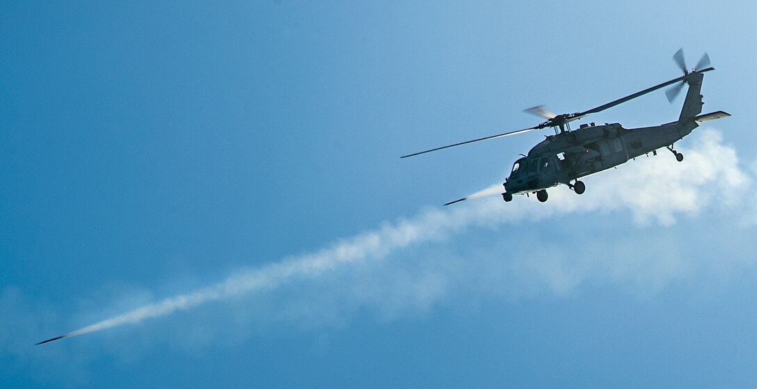 An MH-60S Sea Hawk helicopter participates in a live-fire exercise.
