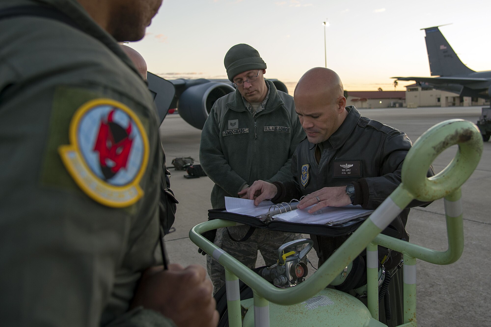 U.S. Air Force Lt. Col. Ricardo Lopez, the 50th Air Refueling Squadron (ARS) commander, reviews the aircraft documentation before taking off for the first 50th ARS’s training mission at MacDill Air Force Base, Fla., Jan. 16, 2018. The 50th ARS brought with it eight new aircraft to MacDill, expanding Air Mobility Command’s global reach. (U.S. Air Force photo by Airman 1st Class Caleb Nunez)