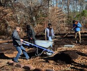 Fort Eustis Boys Scouts Troop 45 members work on a restoration project for a cemetery plot at Joint Base Langley-Eustis, Va., Jan. 20, 2018.