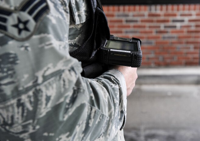 Senior Airman Ryan Anthony, 628th Security Forces Squadron installation entry controller, stands the gate, to check people onto base Jan. 12, 2018, at Joint Base Charleston, S.C.