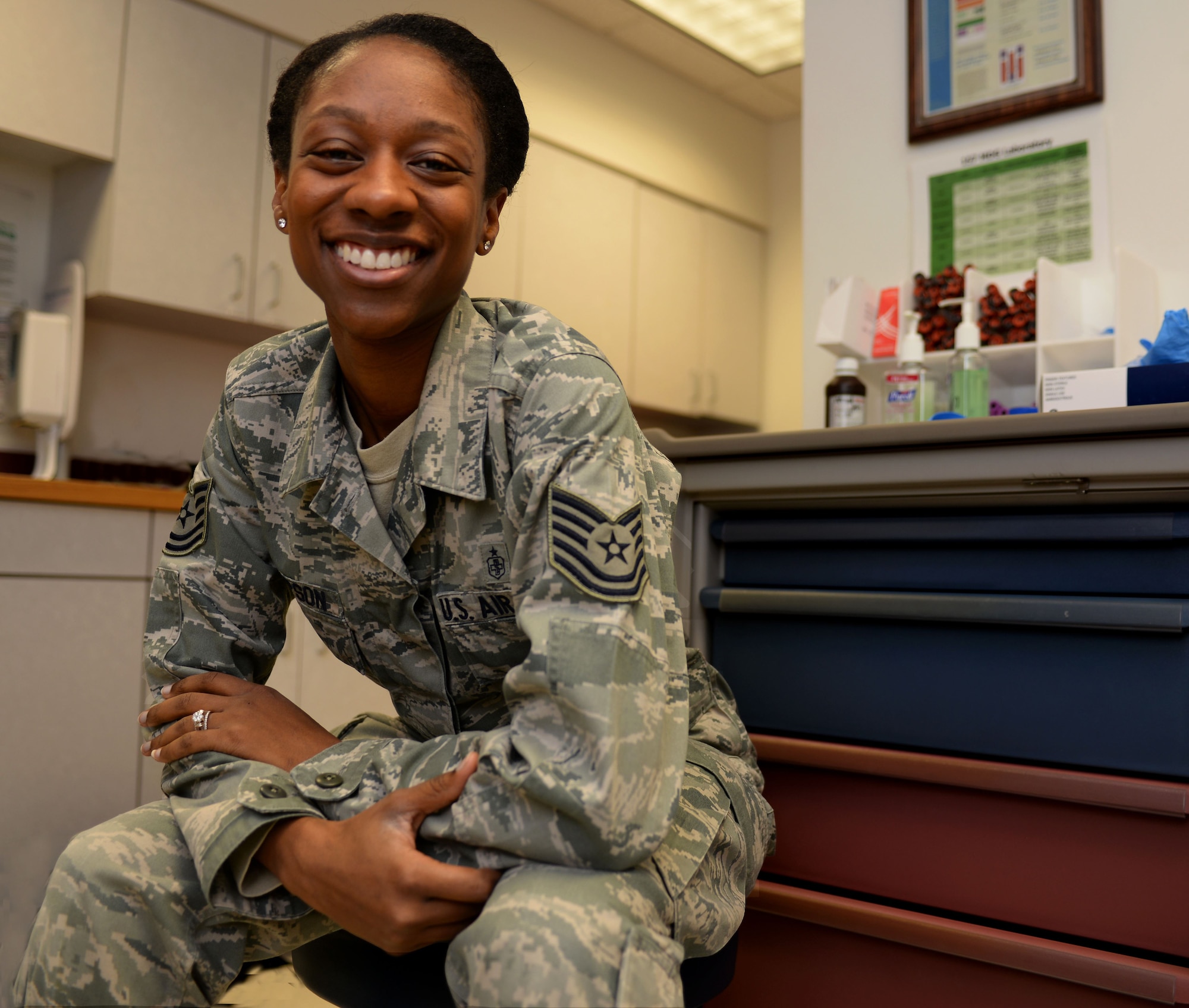 Tech. Sgt. Shanelle I. Sampson, the flight medical technician assigned to the 64th Air Refueling Squadron, poses for a portrait on Jan. 12, 2018, at Pease Air National Guard Base, N.H. Sampson was one of a select number of Airmen within the Air Mobility Command to receive a step promotion in 2017. (N.H. Air National Guard photo by Staff Sgt. Kayla Rorick)