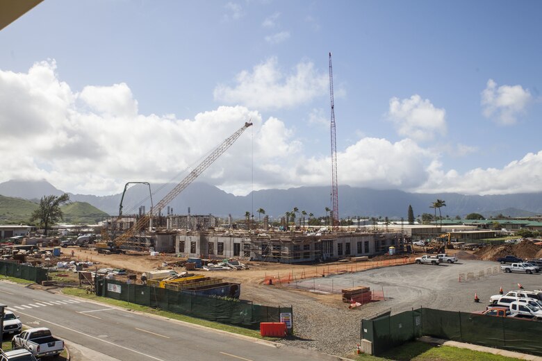Construction is underway at the site for the new Naval Branch Health Clinic, Marine Corps Base Hawaii, Jan. 11, 2017. The new facility will open in April 2019, which will benefit U.S Service members and their families with timely medical care by consolidating all clinics aboard the installation under one roof. The 96,000 square feet structure will promote mission readiness by having two stories encompassing services such as a pharmacy, physical therapy and primary health care. (U.S. Marine Corps photo by Cpl. Jesus Sepulveda Torres)