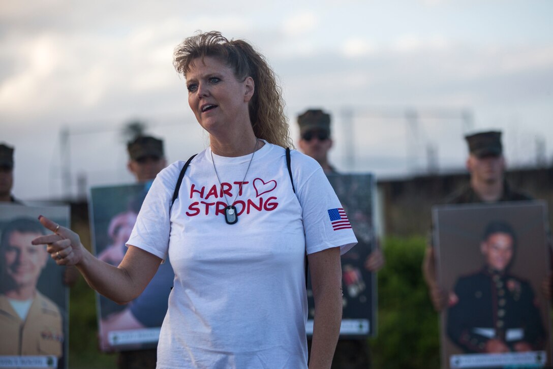 Trina Hart addresses Marine Heavy Helicopter Squadron 463 (HMH-463) upon the completion of squadron’s memorial hike, Marine Corps Base Hawaii, Jan. 11, 2018. The hike commemorated the 12 Marines, including Hart’s son, Lance Cpl. Tyler Hart, from the squadron who were lost in a CH-53E crash while conducting training operations in 2016. While the hike was a solemn reminder of those the squadron lost, it also served as an event to help celebrate the Marines’ lives and the proud traditions of HMH-463. (U.S. Marine Corps Photo by Lance Cpl. Luke Kuennen)