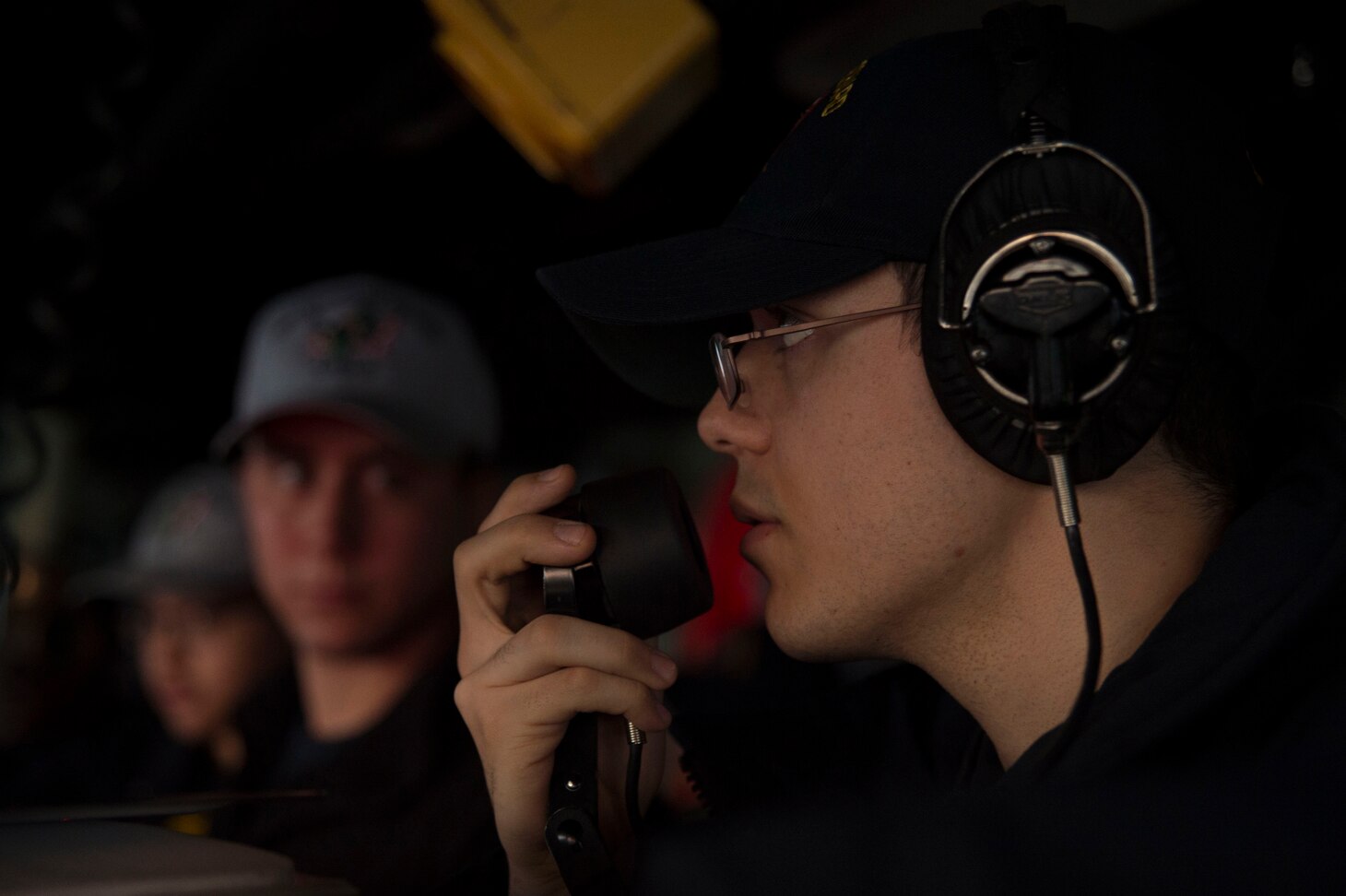 Ensign Adam Hansen communicates using a sound-powered phone on the bridge of the amphibious assault ship USS Bonhomme Richard (LHD 6) prior to the ship’s departure from Sasebo, Japan. Bonhomme Richard is underway conducting a Readiness for Sea assessment ahead of a regularly scheduled patrol in the Indo-Asia-
Pacific region.