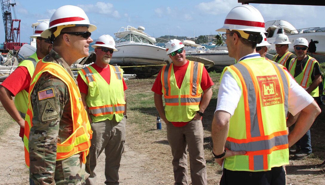 South Atlantic Division Deputy Commander Col. Patrick C. Hogeboom, left, meets with staff at the U.S. Virgin Islands Recovery Field Office on St. Croix, Jan. 22. Hogeboom spent the day on reviewing recovery efforts from hurricanes Irma and Maria and visiting with deployed Corps employees who are assisting those efforts. (USACE photo by Brooks Hubbard)