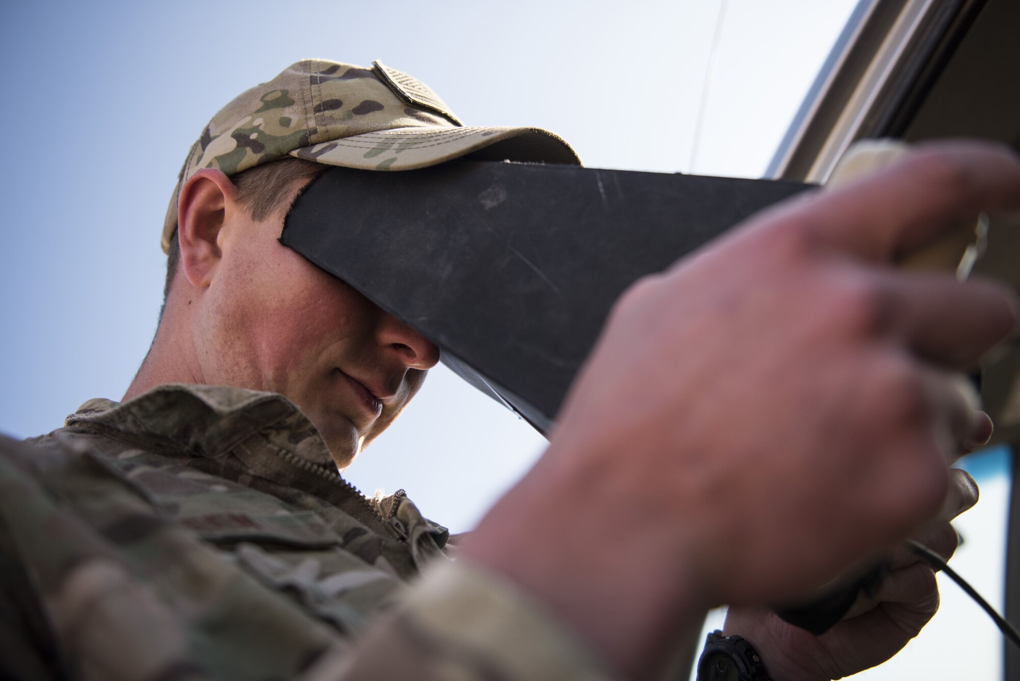 Staff Sgt. Zachary Green, assigned to the 332d Expeditionary Security Forces Squadron, pilots a Raven B Digital Data Link drone via remote control during a demonstration Jan. 24, 2018 in Southwest Asia. The Raven B is an efficient solution for the 332d ESFS, which is tasked with securing an expansive installation perimeter 24 hours a day. (U.S. Air Force photo by Staff Sgt. Joshua Kleinholz)