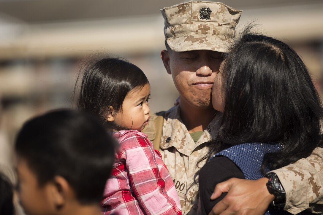 U.S. Marines and sailors assigned to Task Force Southwest are greeted by friends and family after returning from a nine-month deployment to 
 Helmand Province, Afghanistan Jan. 21, 2018 on Marine Corps Base Camp Lejeune, N.C. The Task Force of roughly 300 personnel from II Marine Expeditionary Force deployed in Spring of 2017 in support of the NATO-led Resolute Support mission. Led by Brig. Gen Roger B. Turner, the Task Force trained and advised key leaders within the Afghan National Army 215th Corps and the 505th Zone National Police. The redeployment of the Marines and sailors is the largest since 1st Battalion, 2nd Marines concluded the Marine Corps’ combat role in Afghanistan in late 2014. They transferred authority to a new rotation of Marines, led by Brig. Gen. Benjamin T. Watson, at Camp Shorab, January 15, 2018. (U.S. Marine Corps photo by Sgt. Matthew Callahan)