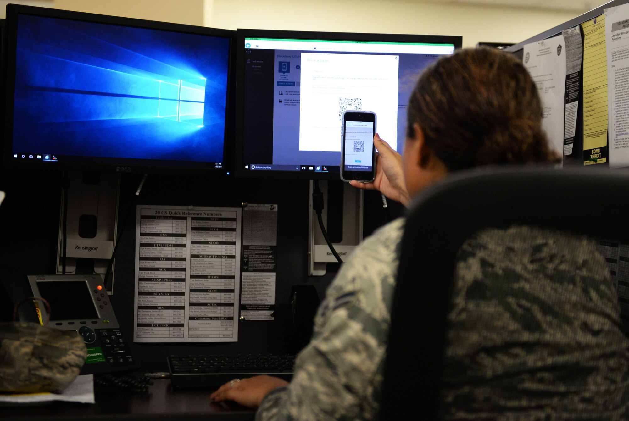 U.S. Air Force Airman 1st Class Velenzia Varner, 20th Communication Squadron client systems technician works on an iPhone at Shaw Air Force Base, S.C., Jan. 22, 2018.