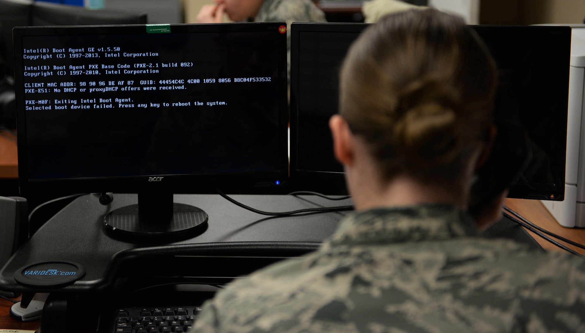 U.S. Air Force Airman 1st Class Eleanor Anderson, 20th Communication Squadron client systems technician, works on updating a computer to Windows 10 at Shaw Air Force Base, S.C., Jan. 22, 2018.