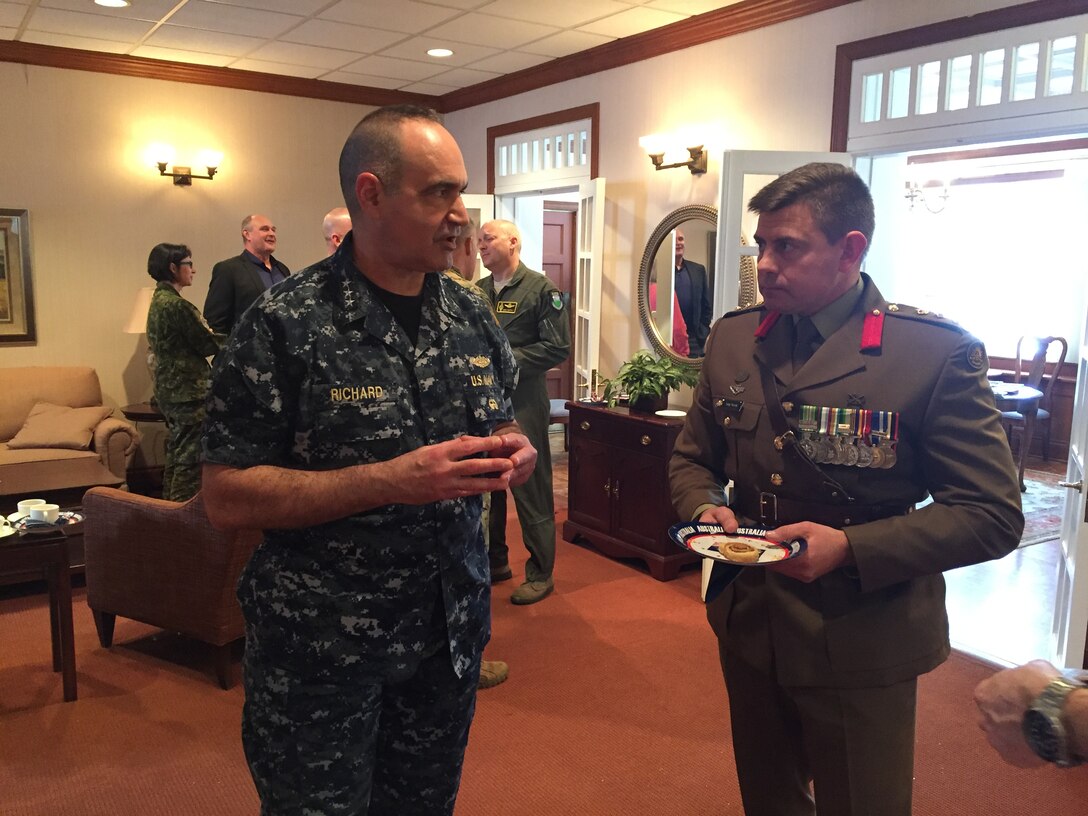 U.S. Navy Adm. Charles Richard (left), deputy commander of U.S. Strategic Command (USSTRATCOM), and Australian Army Col. Gregory Novak, Australian liaison to USSTRATCOM, speak during an Australia Day recognition event at Offutt Air Force Base, Neb., Jan. 23, 2018.  Novak hosted USSTRATCOM leaders and liaison officers from the United Kingdom, Denmark, Canada and the Republic of Korea at the event. Australia Day is celebrated on January 26 each year on the anniversary of Britain’s First Fleet arriving at Port Jackson, New South Wales in 1788. (U.S. Navy photo by Capt. Brook DeWalt)