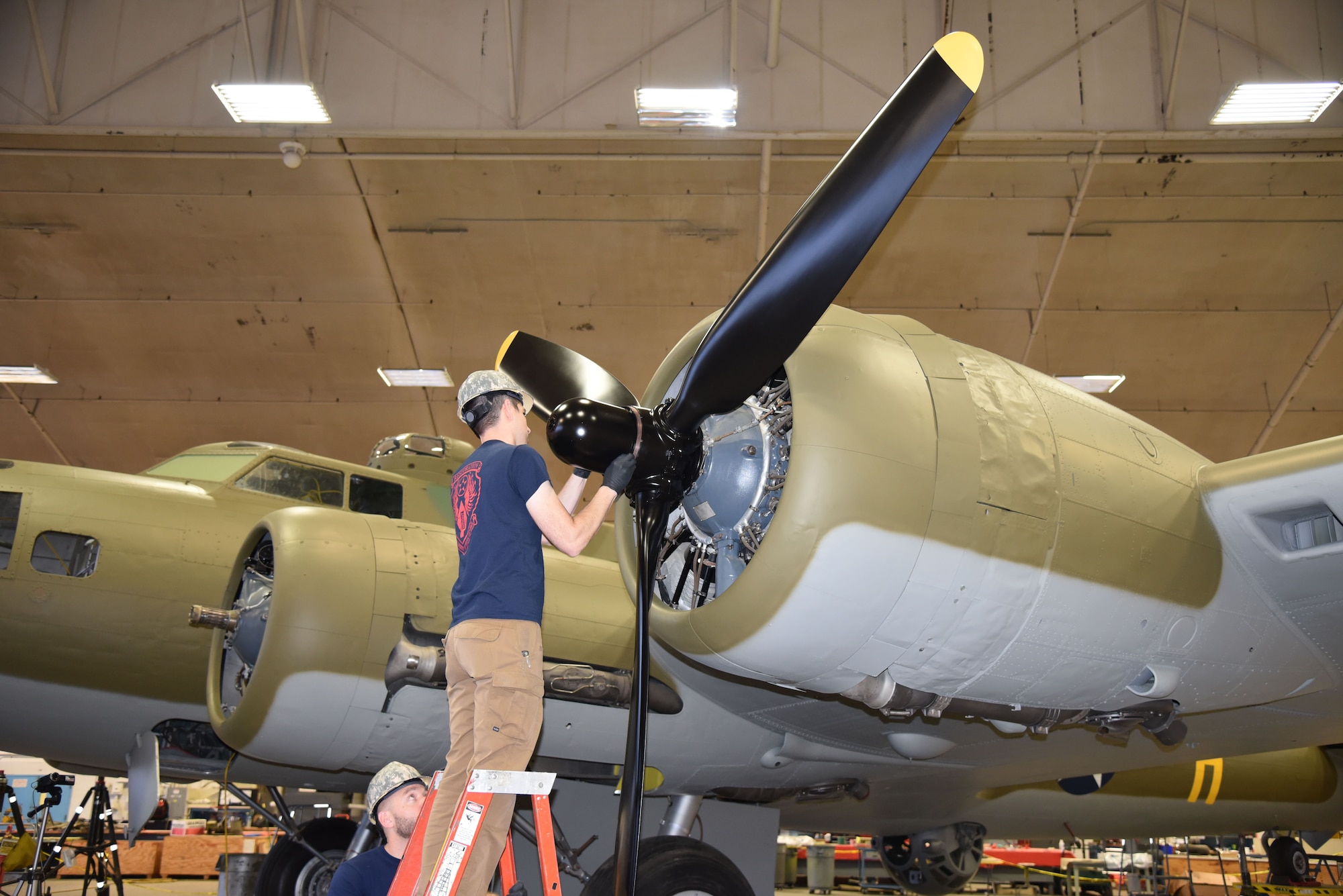 (01/23/2018) -- National Museum of the U.S. Air Force restoration crews installing propeller number one on the Boeing B-17F Memphis Belle™. Plans call for the aircraft to be placed on permanent public display in the WWII Gallery here at the National Museum of the U.S. Air Force on May 17, 2018. (U.S. Air Force photo by Ken LaRock)