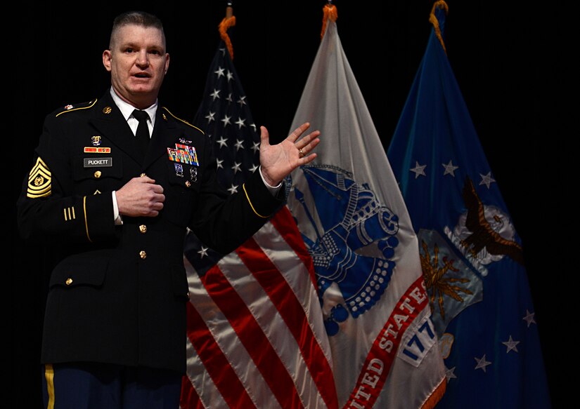 U.S. Army Command Sgt. Maj. Drury Puckett III, U.S. Army Aviation School NCO Academy commandant, provides opening remarks during the Sergeant Audie Murphy Club Induction Ceremony at Joint Base Langley-Eustis, Va., Jan. 21, 2018.