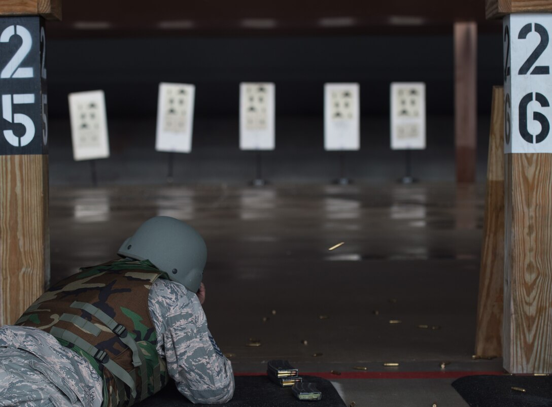 U.S. Air Force Master Sgt. Daniel Young, 1st Aircraft Maintenance Squadron production superintendent, fires an M-4 Carbine at targets during training at the combat arms training and maintenance range at Joint Base Langley-Eustis, Va., Jan. 23, 2018.