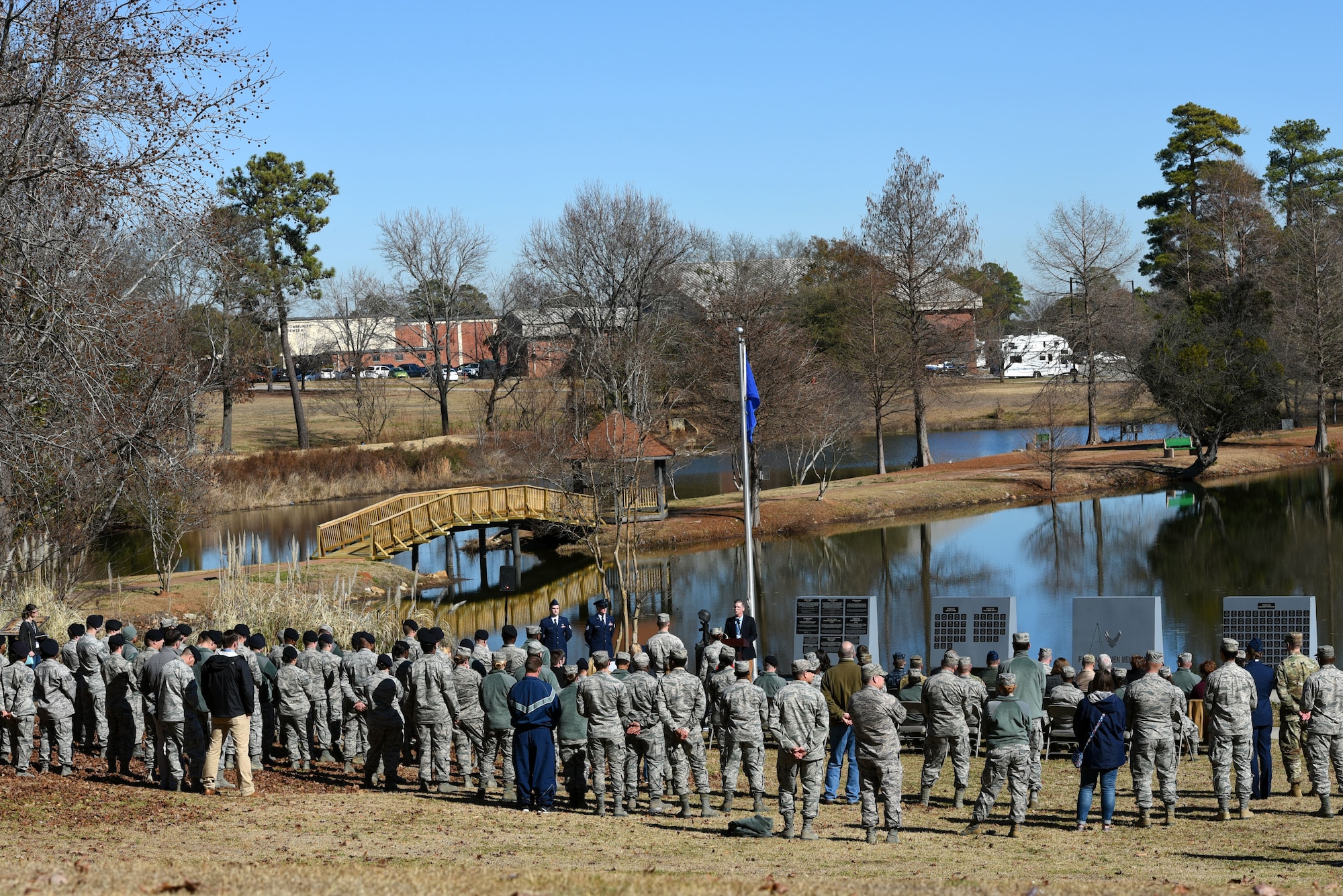 U.S. Airmen, Soldiers and the family members of late Col. Charles C. Heckel, a World War II prisoner of war, gather to recognize his sacrifices during a Prisoner of War Medal presentation ceremony at Shaw Air Force Base, S.C., Jan. 19, 2018.