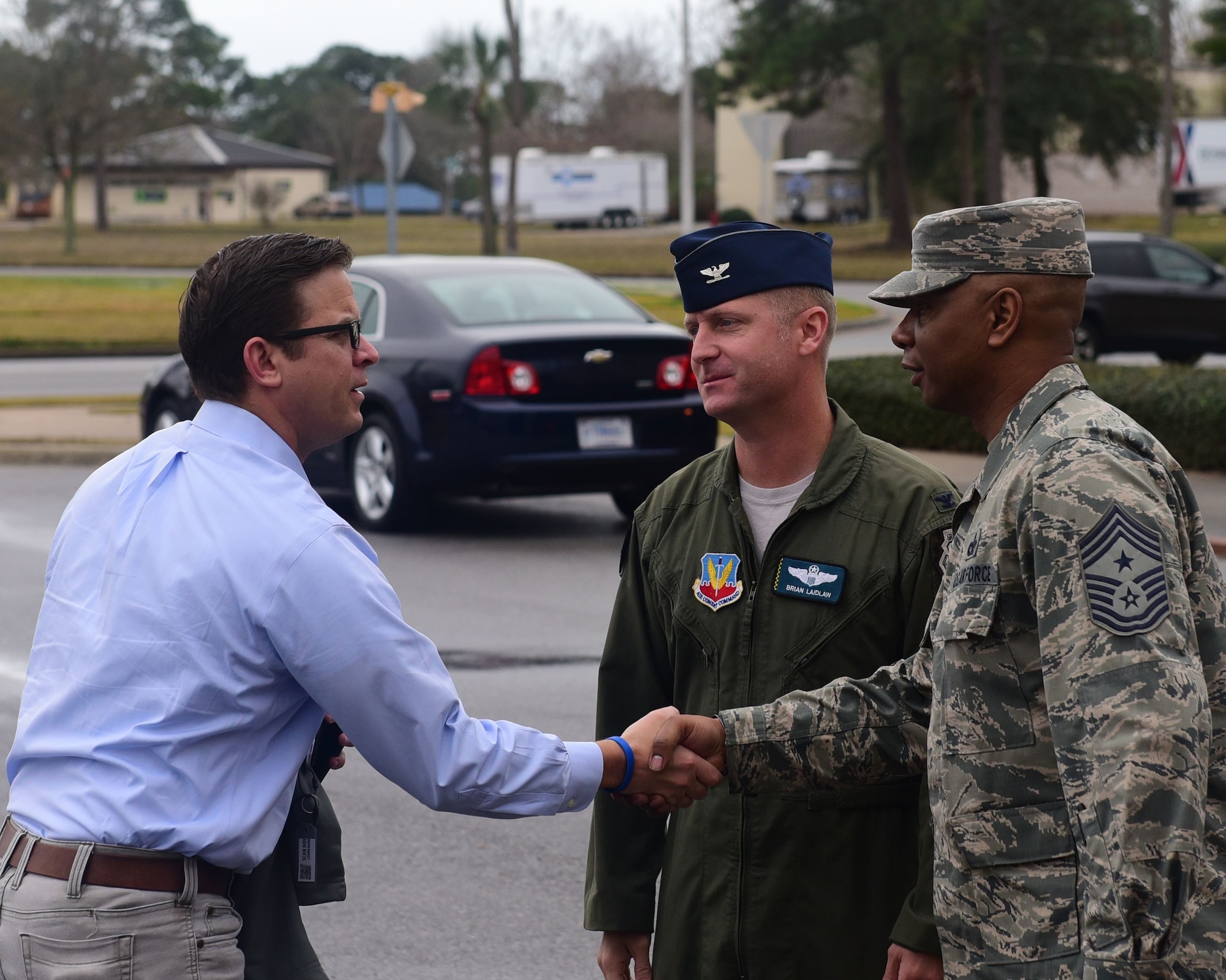 Florida Lt. Gov. Carlos Lopez-Cantera meets Col. Brian Laidlaw, 325th Fighter Wing vice commander, and CMSgt Craig Williams, 325th FW command chief, at Tyndall Air Force Base, Fla., Jan. 10, 2018. Lopez-Cantera visited Tyndall to learn about the 325th Fighter Wing mission and to be briefed on the critical skills and assets the 325th FW can bring to the air dominance theater. (U.S. Air Force photo by Senior Airman Cody R. Miller/Released)
