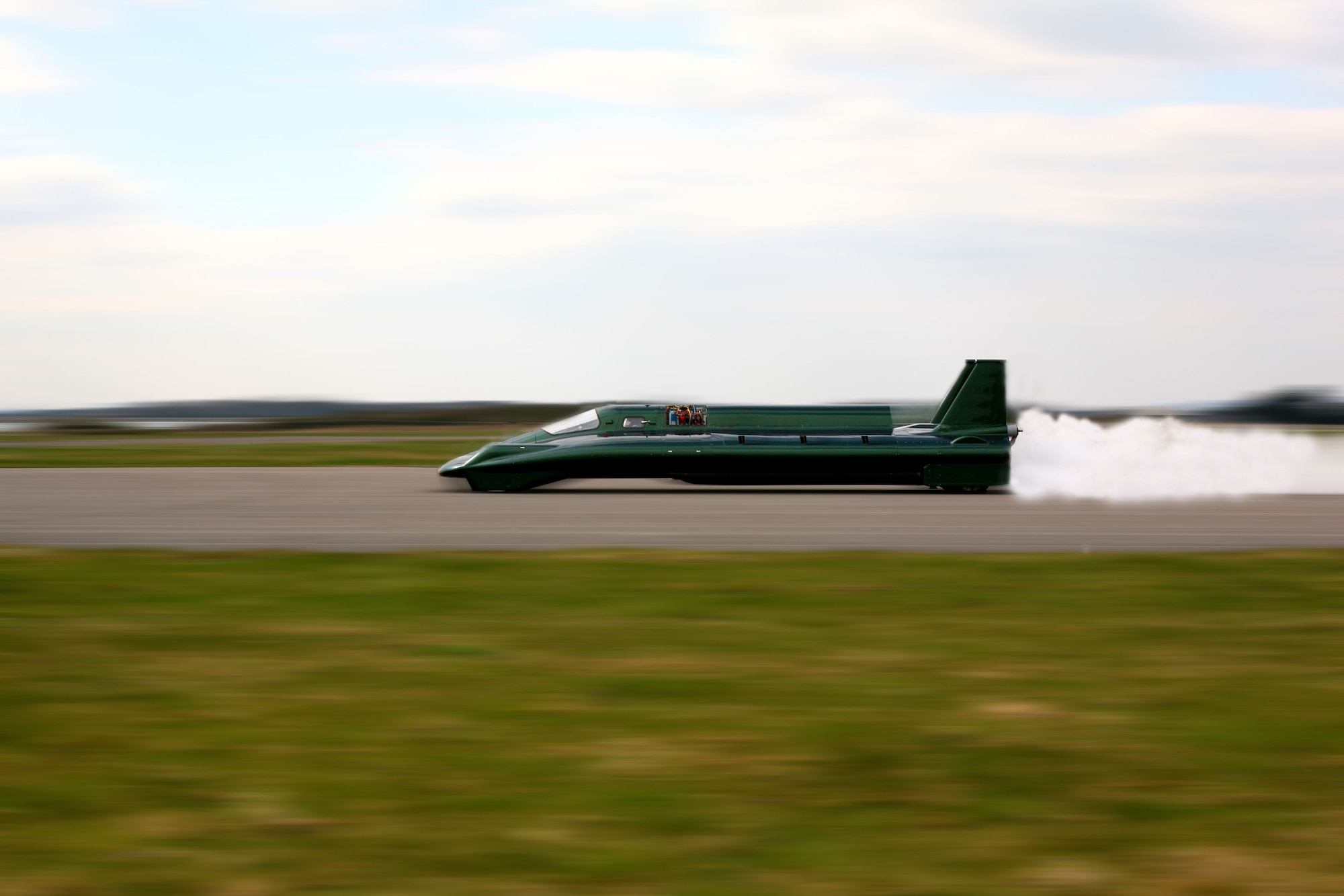 The British steam car performs its basic operational trial April 1, 2009, at former World War II Royal Air Force Base Thorney Island in England. Steam heated by liquid petroleum powered the car. The car was brought to Edwards Air Force Base, California, to use the lake bed as a natural environment to test the car's technology. (Courtesy photo)
