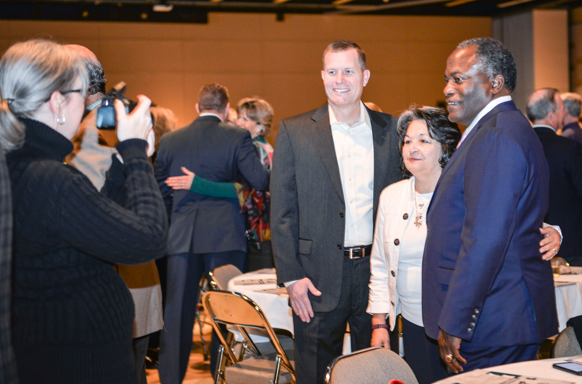 U.S. Air Force Col. Jeffrey Sorrell, 17th Training Wing vice commander, poses for a photo with retired Lt. Gen. Ronnie Hawkins and his wife, Maria, at the McNease Convention Center, San Angelo, Texas, Jan. 23, 2018. The San Angelo Chamber of Commerce celebrated 102 years since it was founded. (U.S. Air Force photo by Aryn Lockhart/Released)