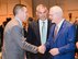 U.S. Air Force Col. Jason Beck, 17th Training Wing Mission Support Group commander, Col. Alejandro Ganster, 17th Training Group commander greet the interim Chamber of Commerce President, Mike Boyd, during the San Angelo Chamber of Commerce Annual Awards Banquet held at the McNease Convention Center, San Angelo, Texas, Jan. 23, 2018. Annually, the Chamber of Commerce hosts a Goodfellow Appreciation Day to honor the base and its role in the community. (U.S. Air Force photo by Aryn Lockhart/Released)