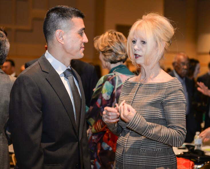U.S. Air Force Col. Ricky Mills, 17th Training Wing commander, visits with San Angelo Mayor, Brenda Gunter, during the San Angelo Chamber of Commerce Annual Awards Banquet held at the McNease Convention Center, San Angelo, Texas, Jan. 23, 2018. Goodfellow Air Force Base partners closely with the San Angelo community leading the Air Force in partnership agreements. (U.S. Air Force photo by Aryn Lockhart/Released)
