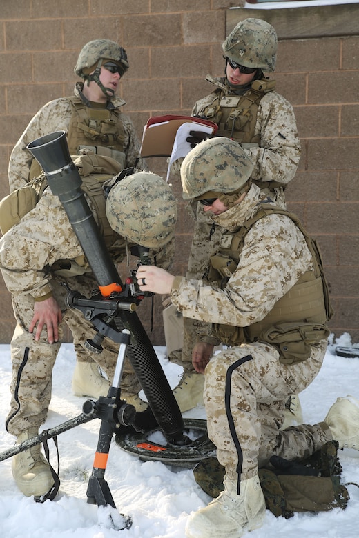 Marines with Weapons Company, 1st Battalion, 24th Marines, 25th Marine Regiment, 4th Marine Division, conduct virtual call for fire training during exercise Nordic Frost at Camp Ethan Allen Training Site in Jericho, Vt., Jan. 20, 2018. The exercise allowed Marines to demonstrate their ability to operate in a cold weather mountainous environment, conducting land navigation, marksmanship training, demolitions, call for fire training and other core competencies. (U.S. Marine Corps photo by Pfc. Samantha Schwoch/released)