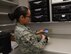 Airman 1st Class Margarita Clayton, 90th Medical Group bioenvironmental engineering technician, uses a Sam 940 to measure the radiation level of a metal sample at F.E. Warren Air Force Base, Wyo., Jan. 23, 2018. The Sam 940 allows the technicians to know their proximity to radiation and the level of contamination. (U.S. Air Force photo by Airman 1st Class Abbigayle Wagner)