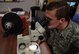 Senior Airman Brad Kepley, 90th Medical Group public health technician, examines mosquito larvae under a microscope at F.E. Warren Air Force Base, Wyo., Jan. 23, 2018. By examining the larvae, public health can work with entomology to prevent the spread of diseases like West Nile Virus. (U.S. Air Force photo by Airman 1st Class Abbigayle Wagner)