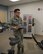 Airman 1st Class Alejandro Castro, 90th Medical Group physical therapy technician, helps lead a patient in exercises at F.E. Warren Air Force Base, Wyo., Jan. 23, 2018. The physical therapy team aids Airmen in regaining strength and mobility after an injury or surgery to return them to duty as soon as possible. (U.S. Air Force photo by Airman 1st Class Abbigayle Wagner)
