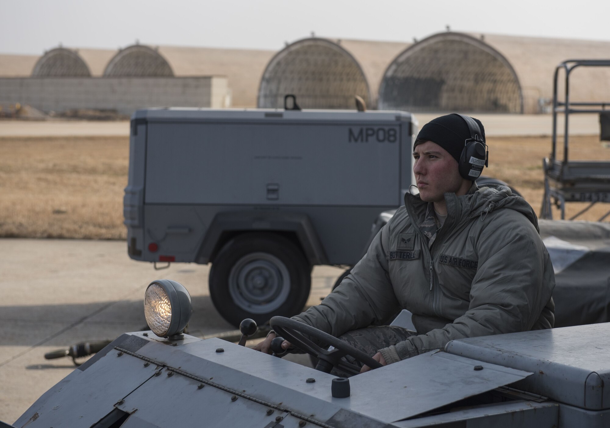 U.S. Air Force Senior Airman David Botterill, 8th Aircraft Maintenance Squadron weapons load crew member, prepares to load an F-16 Fighting Falcon during an aircraft generation exercise at Kunsan Air Base, Republic of Korea, January 22, 2018. Members of load crews precisely and promptly loaded over ten aircraft in under 12 hours confirming the Airmen’s abilities to proficiently carry out a concept of operations. Aircraft generations are simulated on a regular basis to confirm the Wolf Pack’s capability maintain mission readiness at all times. (U.S. Air Force photo by Tech. Sgt. Josh Rosales)